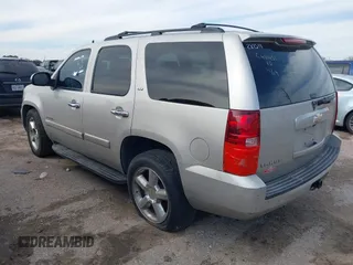 2008 Chevrolet Tahoe LTZ with VIN 1GNFC13JX8R277832, listed as a IAAI auction lot 41348121 with 210,576 mi miles and . Bid and sale history available at DreamBid. Image 3.