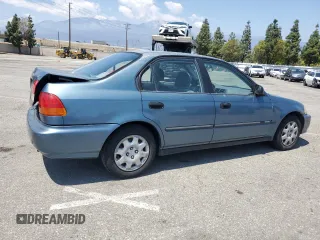 1998 Honda Civic DX with VIN JHMEJ6624WS000450, listed as a Copart auction lot 54217265 with 299,994 mi miles and Salvage Title. Bid and sale history available at carsss.com. Image 3.