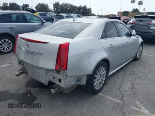 2010 Cadillac CTS Luxury with VIN 1G6DH5EG8A0150181, listed as a IAAI auction lot 42083380 with 110,678 mi miles and . Bid and sale history available at DreamBid. Image 4.