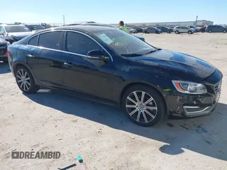 2018 Volvo S60 Inscription Platinum with VIN LYV402HM1JB156380, listed as a IAAI auction lot 41408529 with 106,933 mi miles. Bid and sale history available at carsss.com. Image 1.