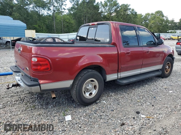 2001 Ford F-150 XLT with VIN 1FTRW07LX1KD65474, listed as a Copart auction lot 61474655 with 361,023 mi miles and Salvage title. Bid and sale history available at DreamBid. Image 3.