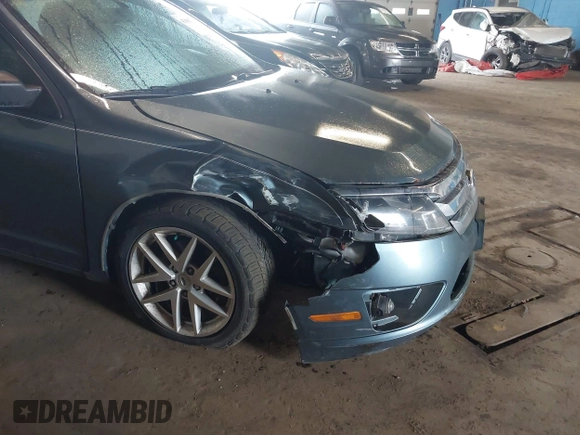 2012 Ford Fusion SEL z VIN 3FAHP0JG1CR352069, wystawiony jako IAAI lot #42182795 z przebiegiem 131 554 mil mil oraz . Historia ofert i sprzedaży dostępna na DreamBid. Obrazek 6.