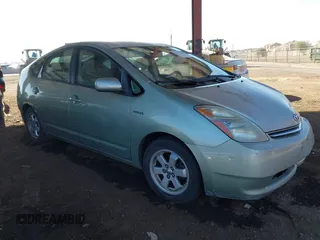 2007 Toyota Prius z VIN JTDKB20U373276019, wystawiony jako IAAI lot #41176723 z przebiegiem 293 424 mil mil oraz . Historia ofert i sprzedaży dostępna na DreamBid. Obrazek 1.