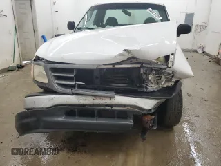 2000 Ford F-150 XL with VIN 1FTRF17L7YNB52822, listed as a Copart auction lot 43421495 with 103,753 mi miles and Salvage title. Bid and sale history available at DreamBid. Image 5.