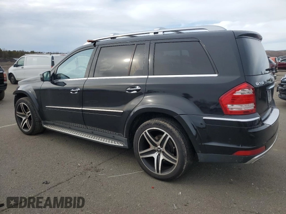 2012 Mercedes-Benz GL-Class GL 550 with VIN 4JGBF8GE7CA784498, listed as a Copart auction lot 45572265 with 114,537 mi miles and Salvage Title. Bid and sale history available at carsss.com. Image 2.