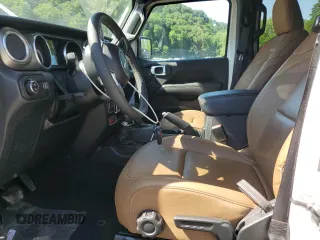 2023 Jeep Gladiator Rubicon with VIN 1C6JJTBG9PL546437, listed as a Copart auction lot 62536575 with 14,106 mi miles and Salvage title. Bid and sale history available at DreamBid. Image 7.