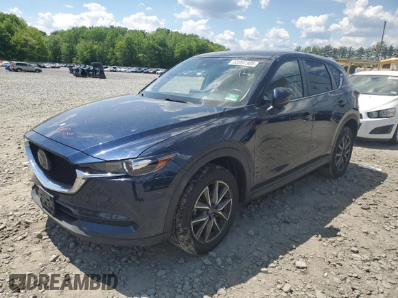 2018 Mazda CX-5 Touring with VIN JM3KFBCMXJ0460020, listed as a Copart auction lot 55997305 with 56,361 mi miles and Salvage Title. Bid and sale history available at DreamBid. Image 1.