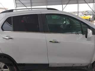2020 Chevrolet Trax LT with VIN KL7CJLSBXLB010793, listed as a IAAI auction lot 41704879 with 124,915 mi miles and . Bid and sale history available at DreamBid. Image 13.