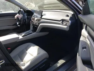 2020 Honda Accord Touring with VIN 1HGCV3F90LA013434, listed as a IAAI auction lot 42075502 with 56,645 mi miles and . Bid and sale history available at DreamBid. Image 5.