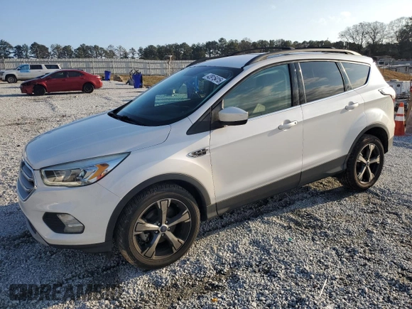 2017 Ford Escape SE with VIN 1FMCU0GD6HUB48986, listed as a Copart auction lot 43915415 with 122,465 mi miles and Salvage Title. Bid and sale history available at DreamBid. Image 1.