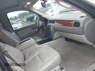 2007 GMC Yukon SLT with VIN 1GKFK13047R288220, listed as a IAAI auction lot 41579399 with 215,464 mi miles. Bid and sale history available at carsss.com. Image 5.