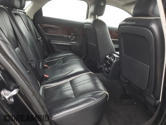 2016 Jaguar XJ R-Sport with VIN SAJWJ1CD7G8V95129, listed as a Copart auction lot 73569464 with 143,740 mi miles and Clean title. Bid and sale history available at DreamBid. Image 10.