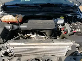 2020 Ram 1500 Tradesman z VIN 1C6SRECG7LN385950, wystawiony jako Copart lot #81577735 z przebiegiem 110 028 mil mil oraz Szkoda całkowita • Salvage title. Historia ofert i sprzedaży dostępna na DreamBid. Obrazek 13.