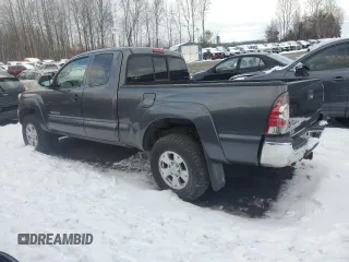 2013 Toyota Tacoma z VIN 5TFUU4EN2DX052230, wystawiony jako Copart lot #43802675 z przebiegiem 102 410 mil mil oraz Szkoda całkowita • Salvage title. Historia ofert i sprzedaży dostępna na DreamBid. Obrazek 2.