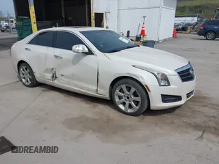 2014 Cadillac ATS Luxury RWD z VIN 1G6AB5RX6E0130600, wystawiony jako IAAI lot #42094510 z przebiegiem 122 872 mil mil oraz . Historia ofert i sprzedaży dostępna na DreamBid. Obrazek 1.