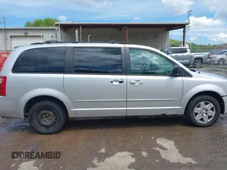 2009 Dodge Grand Caravan SE z VIN 1D8HN44E09B516847, wystawiony jako IAAI lot #42222476 z przebiegiem 190 090 mil mil oraz . Historia ofert i sprzedaży dostępna na DreamBid. Obrazek 14.