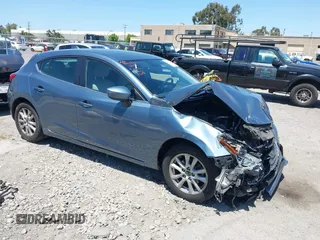 2015 Mazda 3 i Touring with VIN 3MZBM1L74FM157349, listed as a IAAI auction lot 42620750 with 93,850 mi miles and . Bid and sale history available at DreamBid. Image 1.
