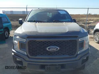 2019 Ford F-150 XL with VIN 1FTEW1CP4KKD69695, listed as a IAAI auction lot 41396598 with 103,855 mi miles and . Bid and sale history available at carsss.com. Image 12.