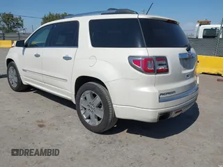 2013 GMC Acadia Denali z VIN 1GKKVTKD2DJ171476, wystawiony jako IAAI lot #42453510 z przebiegiem 129 787 mil mil oraz . Historia ofert i sprzedaży dostępna na DreamBid. Obrazek 3.