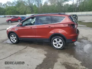 2015 Ford Escape SE with VIN 1FMCU9GX2FUB47068, listed as a Copart auction lot 54772975 with 97,348 mi miles and Salvage Title. Bid and sale history available at DreamBid. Image 2.