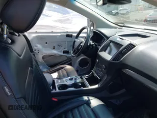 2020 Ford Edge SEL z VIN 2FMPK4J95LBA31157, wystawiony jako IAAI lot #42225863 z przebiegiem 96 082 mil mil oraz . Historia ofert i sprzedaży dostępna na DreamBid. Obrazek 5.