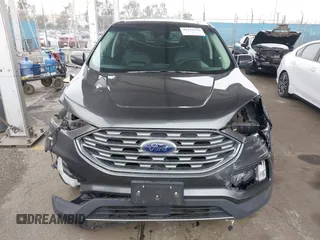 2020 Ford Edge SEL z VIN 2FMPK3J95LBA27779, wystawiony jako IAAI lot #42139536 z przebiegiem 58 285 mil mil oraz . Historia ofert i sprzedaży dostępna na DreamBid. Obrazek 13.