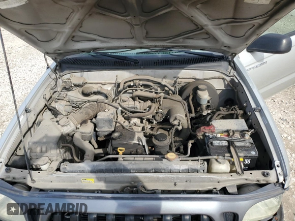 2004 Toyota Tacoma z VIN 5TENL42N34Z452222, wystawiony jako Copart lot #52334205 z przebiegiem 122 503 mil mil oraz Szkoda całkowita • Salvage title. Historia ofert i sprzedaży dostępna na DreamBid. Obrazek 12.