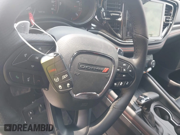2025 Dodge Durango GT Plus with VIN 1C4RDJDG9SC517906, listed as a IAAI auction lot 42164264 with 1,247 mi miles and . Bid and sale history available at DreamBid. Image 11.