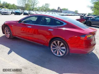 2014 Tesla Model S 60 kWh Battery with VIN 5YJSA1H1XEFP38289, listed as a IAAI auction lot 42092052 with 75,668 mi miles. Bid and sale history available at carsss.com. Image 3.