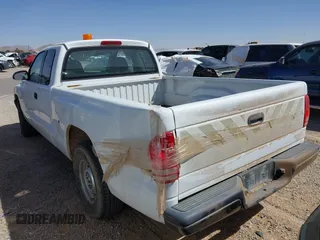 2002 Dodge Dakota with VIN 1B7GL12X32S701273, listed as a IAAI auction lot 41552573 with 157,212 mi miles and . Bid and sale history available at carsss.com. Image 13.