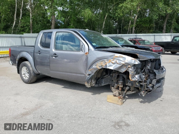 2018 Nissan Frontier Pro-4X with VIN 1N6AD0EV6JN749805, listed as a Copart auction lot 60438555 with Not provided miles and Salvage title. Bid and sale history available at DreamBid. Image 4.
