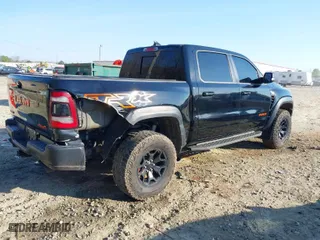 2021 Ram 1500 TRX with VIN 1C6SRFU99MN758770, listed as a IAAI auction lot 38873371 with 59,097 mi miles. Bid and sale history available at carsss.com. Image 4.