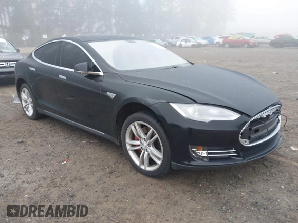 2014 Tesla Model S 60 with VIN 5YJSA1H1XEFP36008, listed as a IAAI auction lot 41287240 with 48,171 mi miles and . Bid and sale history available at DreamBid. Image 1.