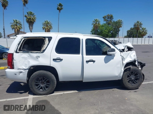 2007 Chevrolet Tahoe LT with VIN 1GNFC13027J407025, listed as a IAAI auction lot 42290155 with Not provided miles and . Bid and sale history available at DreamBid. Image 14.