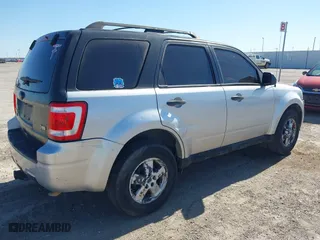2010 Ford Escape XLT with VIN 1FMCU0DG3AKA09821, listed as a IAAI auction lot 41785754 with 208,875 mi miles. Bid and sale history available at carsss.com. Image 4.
