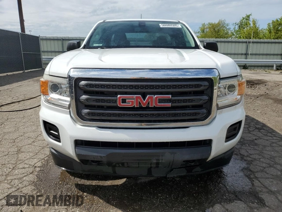 2015 GMC Canyon z VIN 1GTH6AEA7F1163952, wystawiony jako Copart lot #56680505 z przebiegiem 123 025 mil mil oraz Czysty tytuł • Clean title. Historia ofert i sprzedaży dostępna na DreamBid. Obrazek 5.