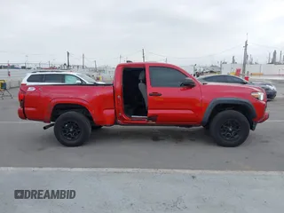 2020 Toyota Tacoma SR with VIN 3TYRX5GNXLT005469, listed as a IAAI auction lot 42267836 with 84,628 mi miles and . Bid and sale history available at DreamBid. Image 14.