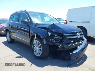 2015 Volkswagen Tiguan SE with VIN WVGAV7AX8FW595806, listed as a IAAI auction lot 42644395 with 51,638 mi miles and . Bid and sale history available at DreamBid. Image 6.