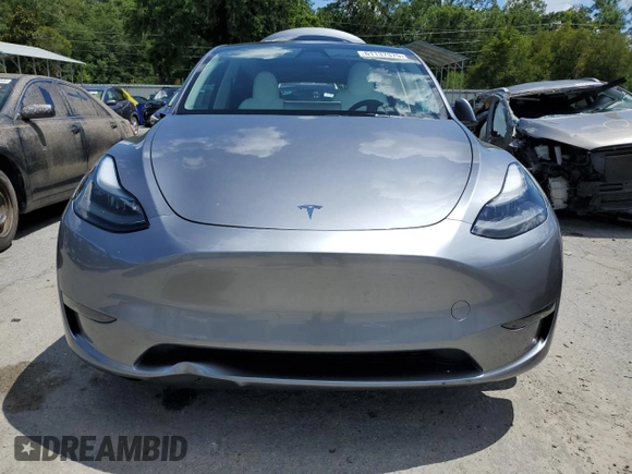 2024 Tesla Model Y Long Range z VIN 7SAYGDEE7RA308338, wystawiony jako Copart lot #61137375 z przebiegiem 19 501 mil mil oraz Szkoda całkowita • Salvage title. Historia ofert i sprzedaży dostępna na DreamBid. Obrazek 5.