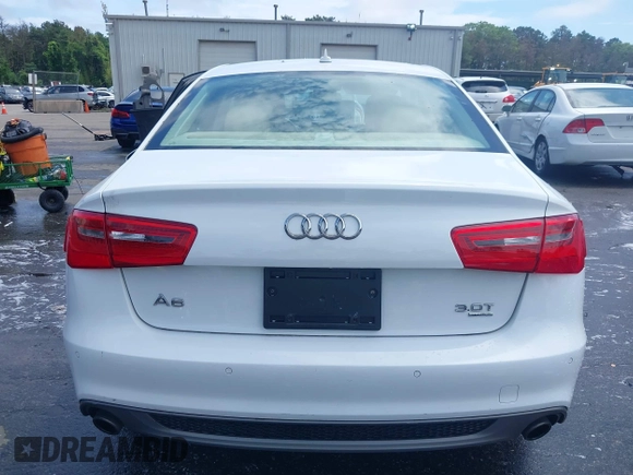 2014 Audi A6 Prestige with VIN WAUHGAFCXEN091050, listed as a IAAI auction lot 42524560 with 169,575 mi miles and . Bid and sale history available at DreamBid. Image 16.