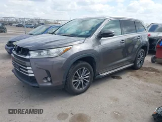 2018 Toyota Highlander SE with VIN 5TDKZRFH9JS544012, listed as a IAAI auction lot 41885296 with 144,500 mi miles and . Bid and sale history available at DreamBid. Image 2.