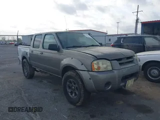 2003 Nissan Frontier XE z VIN 1N6ED27T13C404348, wystawiony jako IAAI lot #41952112 z przebiegiem Nie podano mil oraz . Historia ofert i sprzedaży dostępna na DreamBid. Obrazek 1.