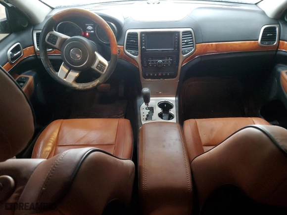 2012 Jeep Grand Cherokee Overland with VIN 1C4RJFCT2CC318931, listed as a Copart auction lot 47194825 with 65,165 mi miles and Salvage Title. Bid and sale history available at carsss.com. Image 8.