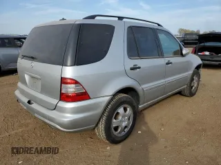 2003 Mercedes-Benz M-Class 3.7L with VIN 4JGAB57E33A421993, listed as a Copart auction lot 71800334 with 210,086 mi miles and Salvage Title. Bid and sale history available at carsss.com. Image 3.