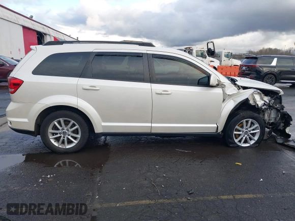 2014 Dodge Journey SXT with VIN 3C4PDCBGXET182430, listed as a IAAI auction lot 41599489 with 143,889 mi miles. Bid and sale history available at carsss.com. Image 13.