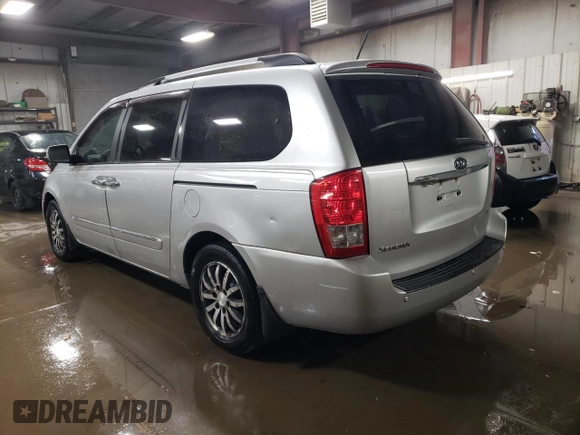2012 Kia Sedona EX with VIN KNDMH4C7XC6483296, listed as a Copart auction lot 76624984 with 203,980 mi miles and Salvage Title. Bid and sale history available at carsss.com. Image 2.