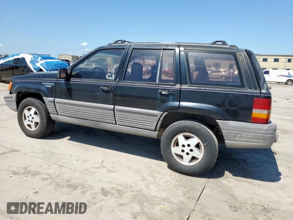 1995 Jeep Grand Cherokee Laredo z VIN 1J4FX58S9SC534442, wystawiony jako Copart lot #61233725 z przebiegiem 363 688 mil mil oraz Szkoda całkowita • Salvage title. Historia ofert i sprzedaży dostępna na DreamBid. Obrazek 2.