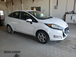 2016 Ford Fiesta SE with VIN 3FADP4BJ4GM173821, listed as a Copart auction lot 48788195 with 54,686 mi miles and Salvage Title. Bid and sale history available at DreamBid. Image 4.