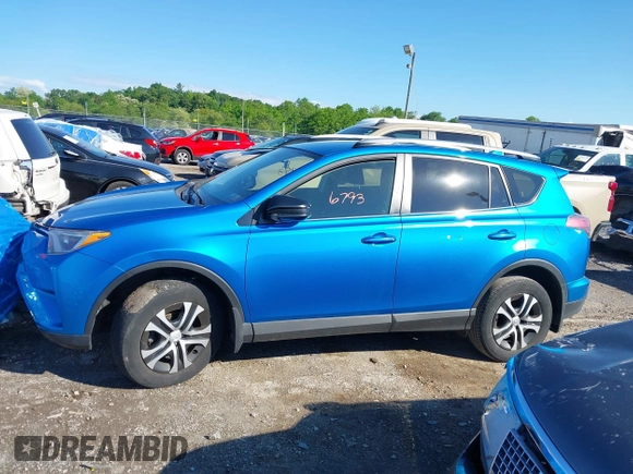 2016 Toyota RAV4 LE with VIN JTMBFREV2GD183811, listed as a IAAI auction lot 42216793 with 95,270 mi miles and . Bid and sale history available at DreamBid. Image 14.
