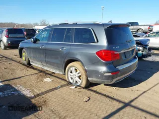2016 Mercedes-Benz GL with VIN 4JGDF6EE3GA645328, listed as a IAAI auction lot 41502439 with 166,321 mi miles. Bid and sale history available at carsss.com. Image 3.